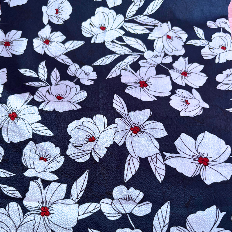 Fleur blanche fond bleu marine