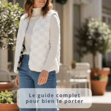 Femme portant un gilet de berger sans manche blanc en fausse fourrure avec col roulé et jean dans un intérieur lumineux. Texte : Gilet de berger - Le guide complet pour bien le porter - [maison-pivoine.fr](https://maison-pivoine.fr)